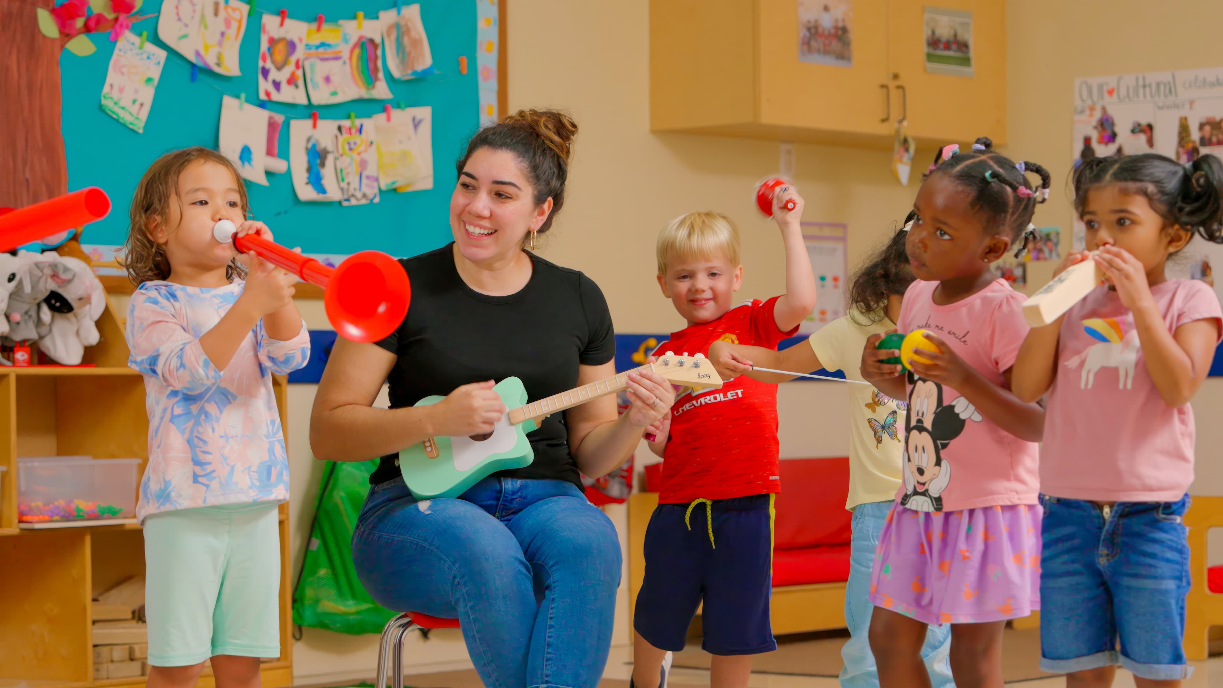 kids enjoying music class