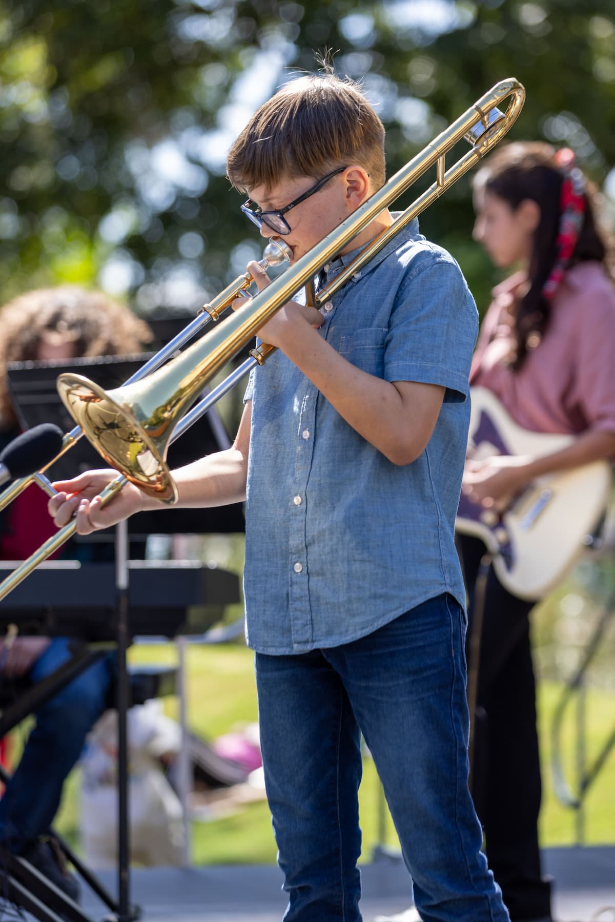 a student playing the trombone